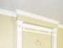 Carpentry: Decorative trim above fireplace