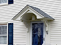 Custom portico and storm door installed