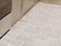 Tiled kitchen floor closeup