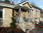 Front entry portico with columns